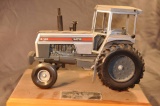 Scale Models 1/16th Scale White 2-135 Tractor On a Plat