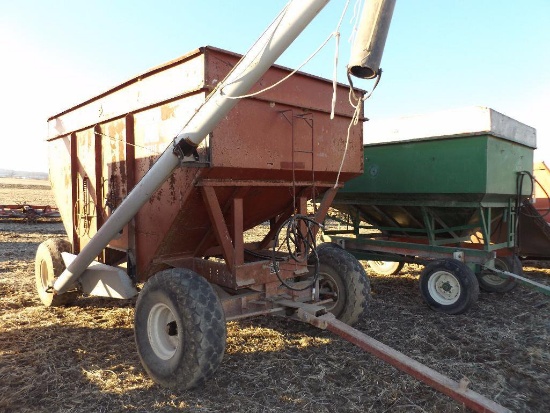 M&W 300B gravity wagon on running gear with 16' hyd. drive auger