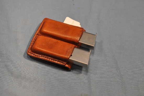 (2) Colt .45 auto magazines w/ holster