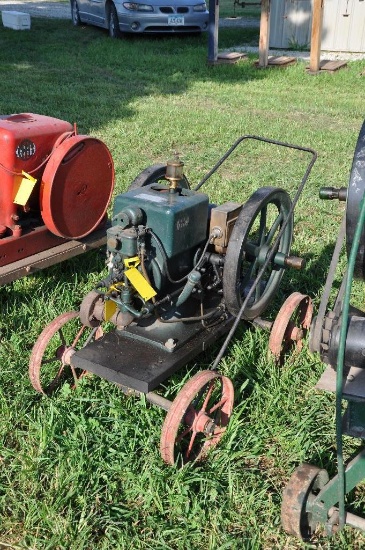 McCormick Deering 1.5 HP engine mounted on steel wheel truck