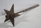 Antique cast iron masonry star on rod