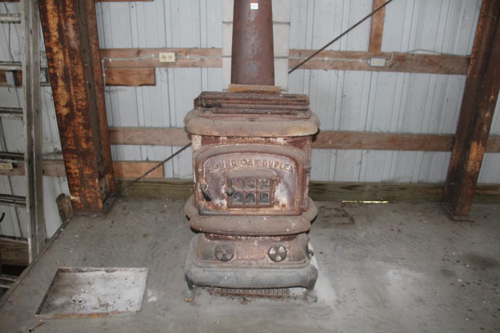 Round Oak duplex wood stove | Proxibid