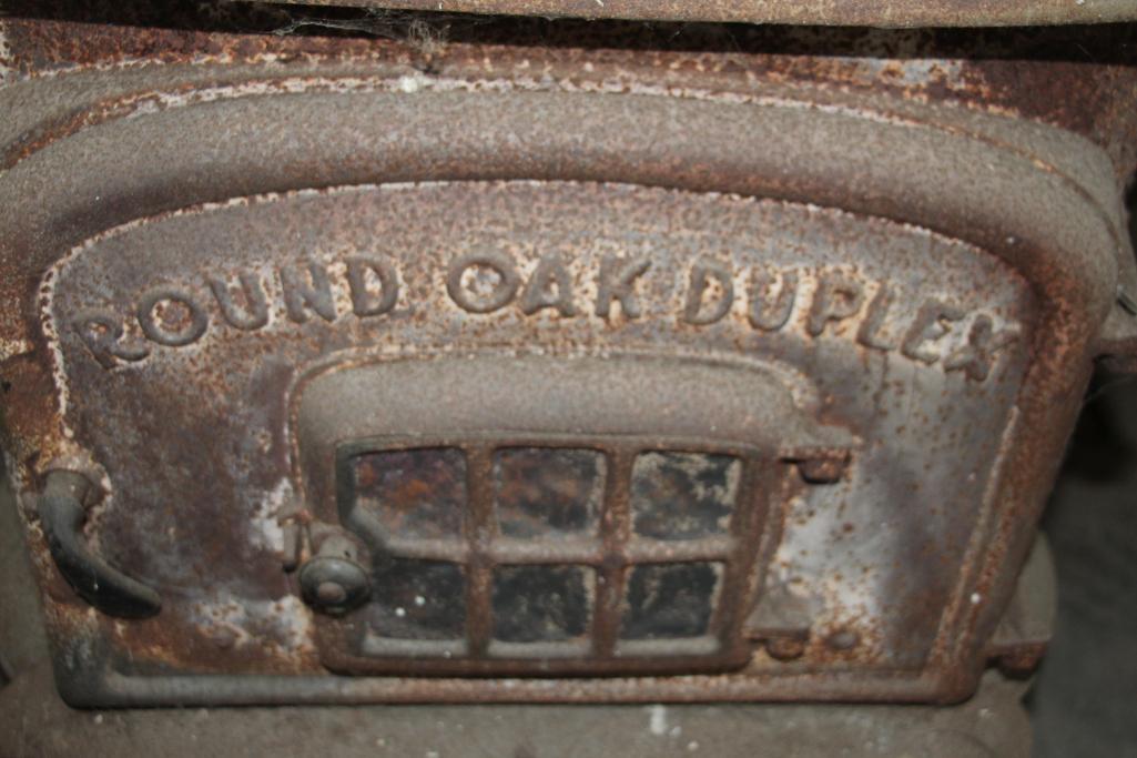 Round Oak duplex wood stove | Proxibid