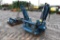 Skid steer mounted tree spade with weights and rear cylinders