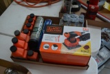 Flat of 2 cycle oil & Black and Decker palm sander
