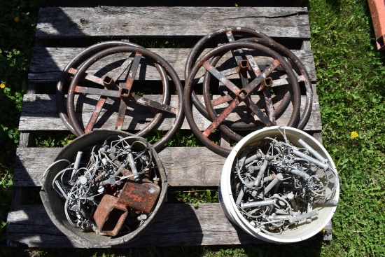 pallet of scaffolding wheels, pins, hardware