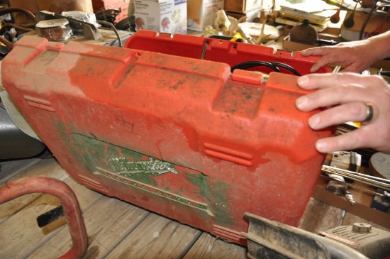 Milwaukee portable band saw with case and extra blades