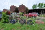 (3) upright fuel barrels on stands