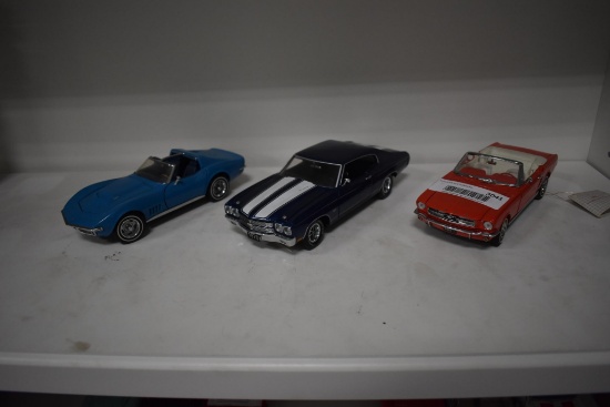 (3) die cast collectible cars