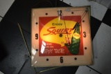 Squirt light-up glass-front clock