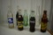 (8) misc soda bottles