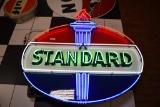 Standard Oil neon hanging sign