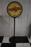 Pennzoil porcelain lollipop sign on original cast iron base