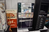 Coin-operated candy vending machine