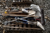 pallet of long handle tools to include shovels