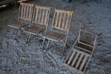 (4) wooden folding chairs