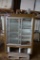 Upright glass front refrigerator