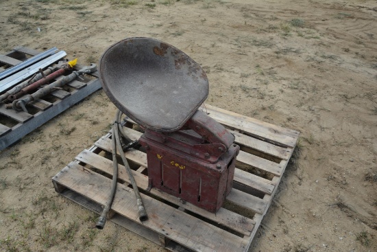 Vintage IH tractor seat assembly