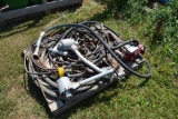 Pallet of hose , cable and a product pump