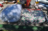 wide variety of colorful quilts and pillows