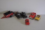 Various toy cars and trucks