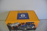 ERTL 1/16 scale New Holland 8260 tractor, 1997 toy farmer