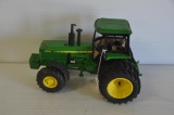 ERTL 1/16 John Deere 4650 toy tractor, broken right side fender