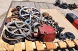 Pallet of assorted pulleys, sprockets, bearings, etc.