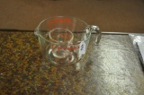 {2} Pyrex mixing cups