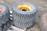 (2) 12-16.5 skidsteer tires on 8-bolt rims