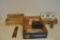 Cheese boxes, buttons, camera, stamps, square nails