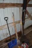 Leaf rakes, brooms, and snow shovel