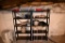 contents of basements which includes metal racks with content, metal bench,