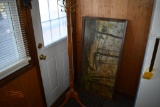 coat rack with hanging picture, by Harlan Young