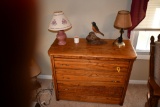 3 drawer oak dresser with contents on top of dresser