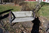home made bench made with steel wagon wheel axle