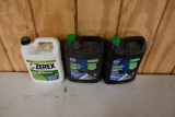 (2) full 1 gal jugs of Car Quest antifreeze and (1) partial 1 gal jug of 50/50 antifreeze