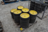 pallet of JD gauge wheels