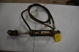 small hyd. cylinder w/ hoses