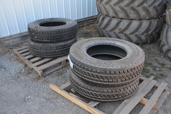 (4) New Americus 295/75R22.5 tires