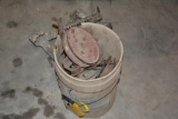 Bucket of pulleys