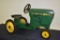 Ertl John Deere metal pedal tractor with narrow front end and plastic seat