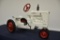 Scale Models McCormick Farmall M Demonstrator 2000 metal pedal tractor with narrow front end and
