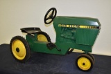 Ertl John Deere metal pedal tractor with narrow front end and plastic seat
