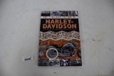 History of Harley Davidson book with poster inside.