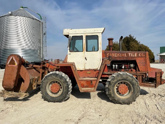 International 4100 4WD tractor w/mounted 10' trench backfill attachment