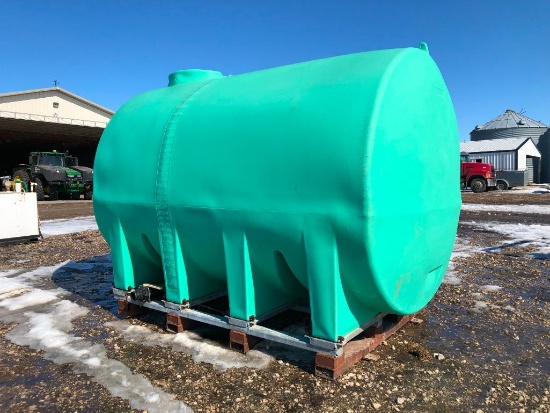 3,000 gal. poly tank on skid