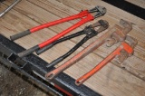 (2) pipe wrenches and (2) bolt cutters