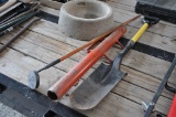 Spade, post driver, magnet, and concrete bowl