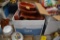 Box of cook books and rubber Smartware kitchen pans